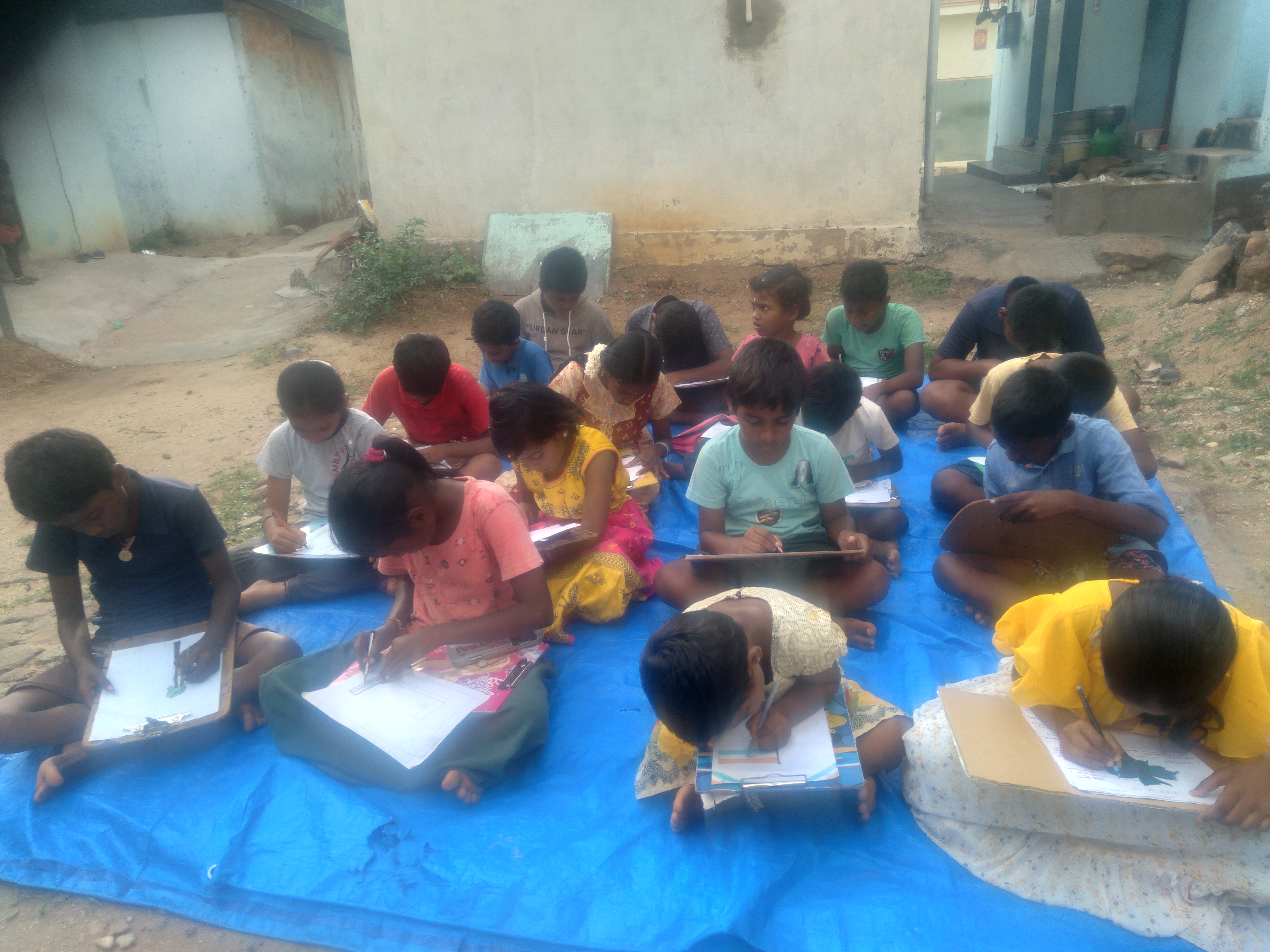 Students participating in drawing competition