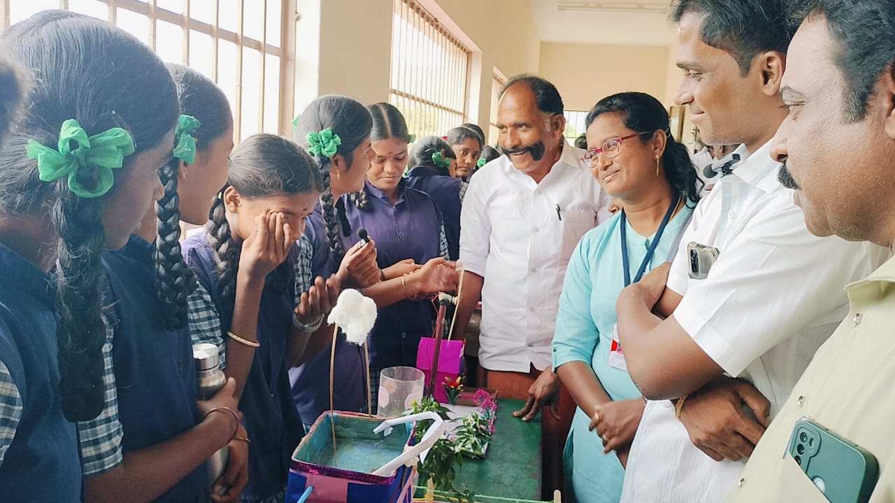 Students participating in scientific exhibition program