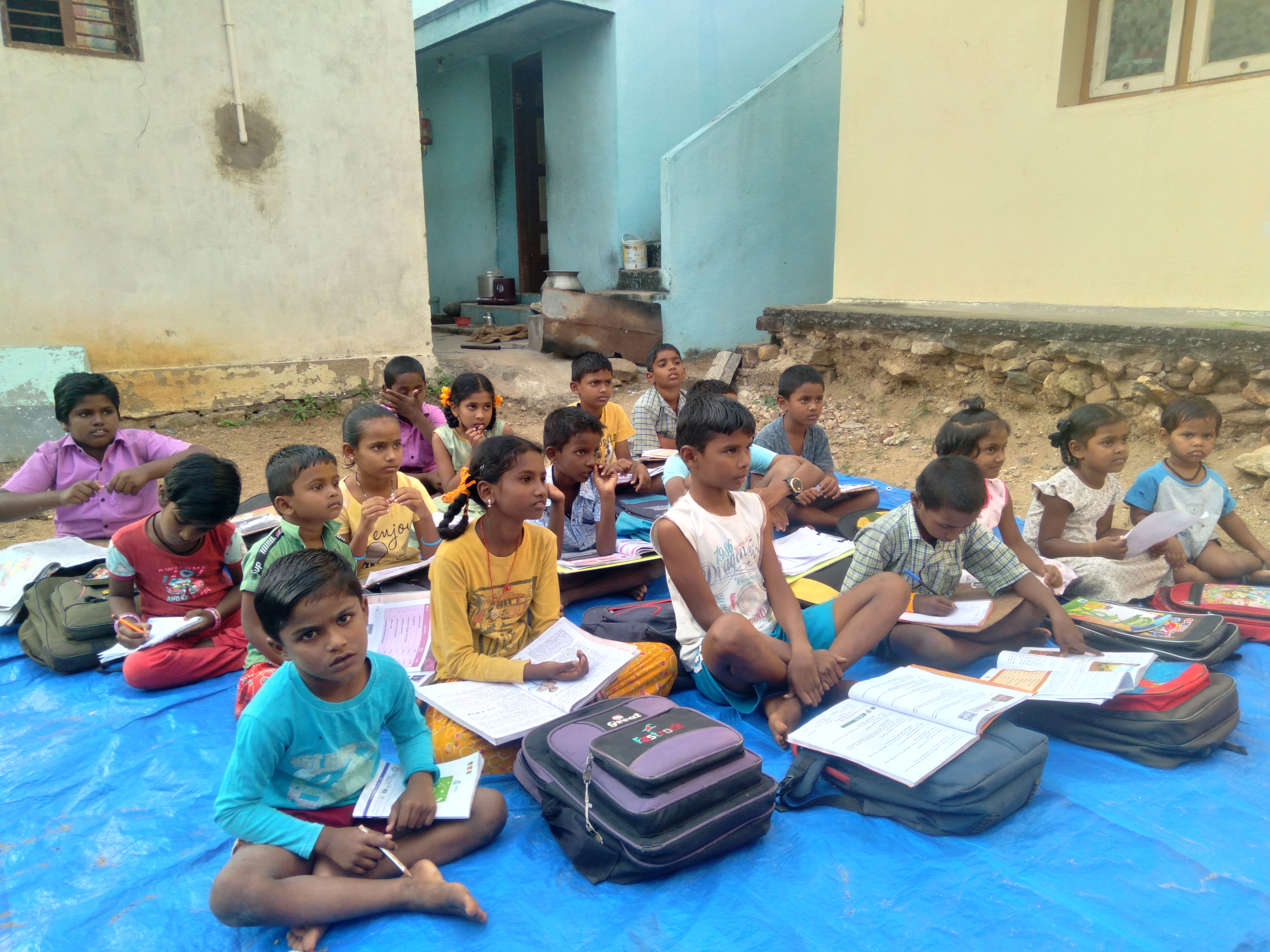 Students receiving free tuition classes from Helper's India Link Educational Trust